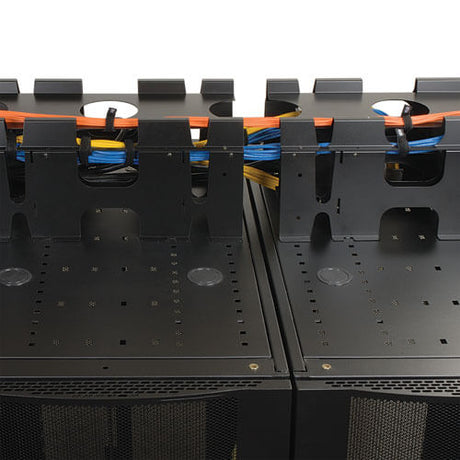 Close-up of a network cable management system with colored cables.